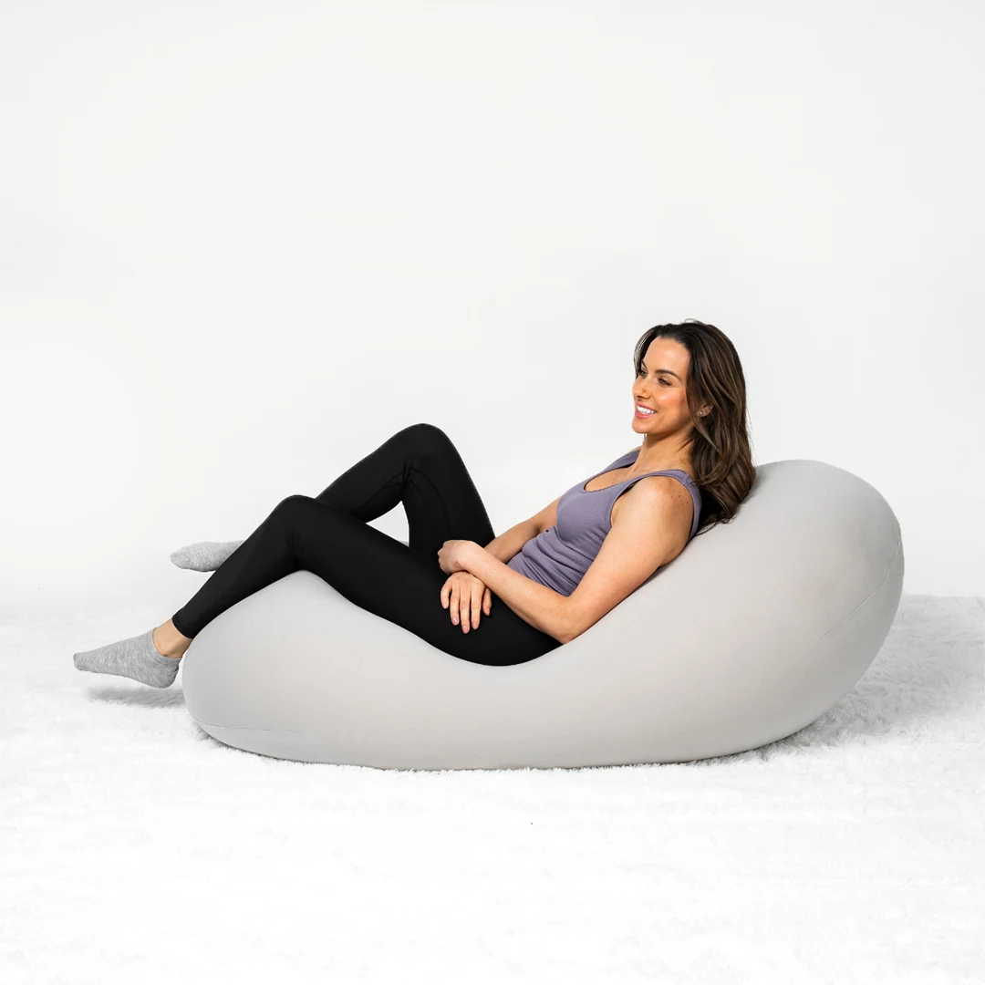 Gray Moon Pod beanbag with a narrow reclining shape